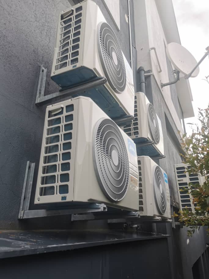 Multi-split AC condenser units installed by Breeze Empire Tech